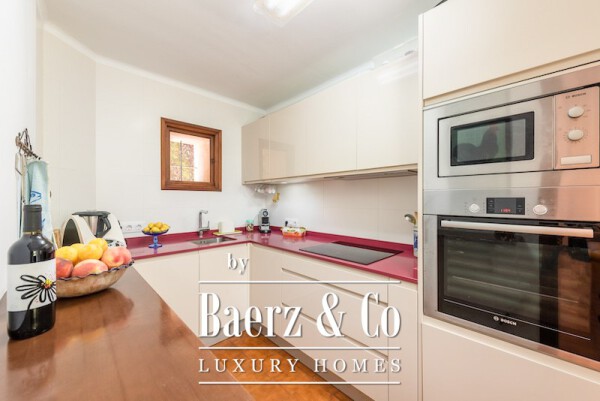 photo 5 This semi-detached townhouse, situated just two minutes' walk from Repic beach, offers just that- a sunny garden and easy access to the beach.